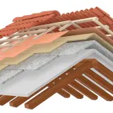 Coupe d'une toiture montrant les différentes couches : tuiles, liteaux, écran sous toiture obligatoire, isolant, pare-vapeur et charpente bois.
