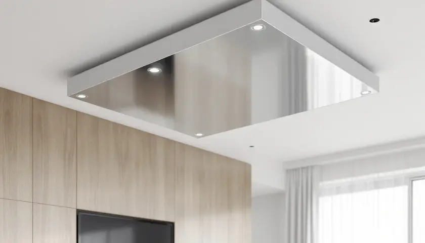 Plafon autoportant norme, design moderne avec surface miroir et éclairage LED intégré, s'intégrant parfaitement à un intérieur contemporain.