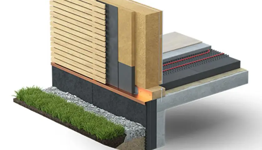 Coupe d'un mur et d'un sol isolés, montrant des couches de bois, de gravier, de mousse de verre et de béton.